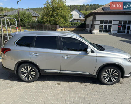 Серый Мицубиси Аутлендер, объемом двигателя 2.36 л и пробегом 123 тыс. км за 22000 $, фото 1 на Automoto.ua