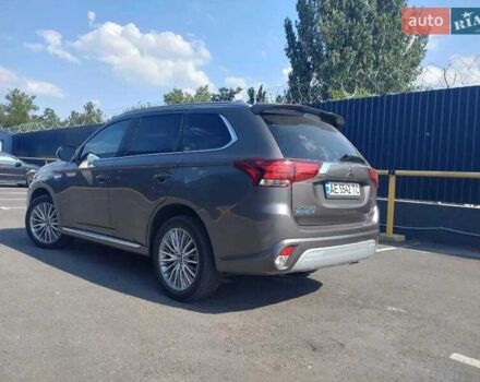 Серый Мицубиси Аутлендер, объемом двигателя 2 л и пробегом 63 тыс. км за 23000 $, фото 2 на Automoto.ua