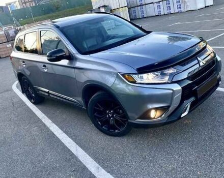 Серый Мицубиси Аутлендер, объемом двигателя 2.4 л и пробегом 93 тыс. км за 14600 $, фото 1 на Automoto.ua