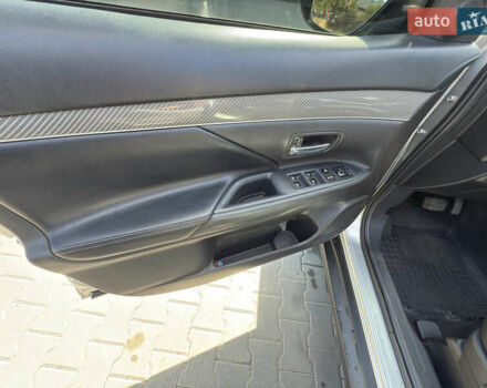 Серый Мицубиси Аутлендер, объемом двигателя 2.36 л и пробегом 123 тыс. км за 22000 $, фото 14 на Automoto.ua