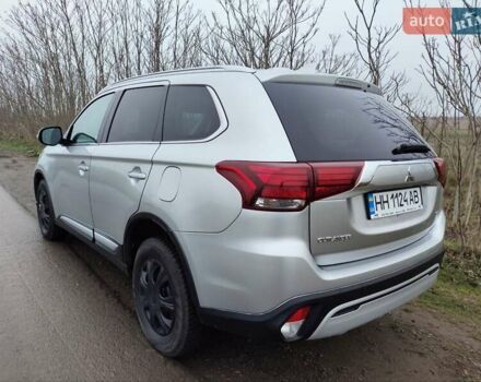 Серый Мицубиси Аутлендер, объемом двигателя 2.36 л и пробегом 101 тыс. км за 16400 $, фото 5 на Automoto.ua