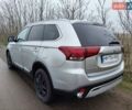 Серый Мицубиси Аутлендер, объемом двигателя 2.36 л и пробегом 101 тыс. км за 16400 $, фото 5 на Automoto.ua