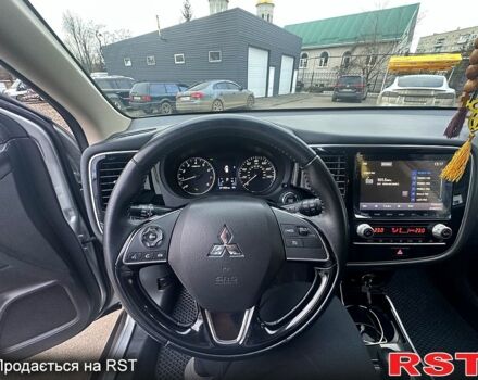 Серый Мицубиси Аутлендер, объемом двигателя 2.4 л и пробегом 115 тыс. км за 17000 $, фото 9 на Automoto.ua