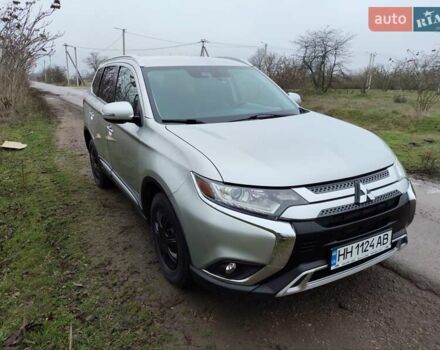 Серый Мицубиси Аутлендер, объемом двигателя 2.36 л и пробегом 101 тыс. км за 16400 $, фото 1 на Automoto.ua