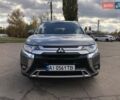 Серый Мицубиси Аутлендер, объемом двигателя 2.36 л и пробегом 155 тыс. км за 17500 $, фото 1 на Automoto.ua