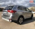 Серый Мицубиси Аутлендер, объемом двигателя 2.36 л и пробегом 155 тыс. км за 17500 $, фото 4 на Automoto.ua