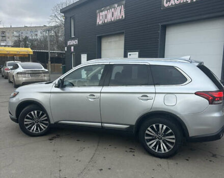 Серый Мицубиси Аутлендер, объемом двигателя 2.4 л и пробегом 115 тыс. км за 17500 $, фото 4 на Automoto.ua