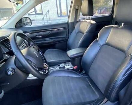 Сірий Міцубісі Аутлендер, об'ємом двигуна 2.4 л та пробігом 133 тис. км за 14000 $, фото 4 на Automoto.ua