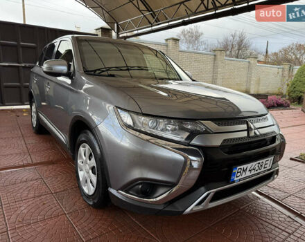 Серый Мицубиси Аутлендер, объемом двигателя 2 л и пробегом 137 тыс. км за 16500 $, фото 1 на Automoto.ua
