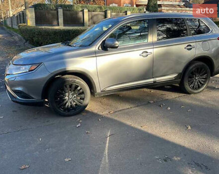 Серый Мицубиси Аутлендер, объемом двигателя 2.4 л и пробегом 120 тыс. км за 23200 $, фото 1 на Automoto.ua