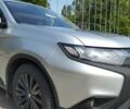 Серый Мицубиси Аутлендер, объемом двигателя 2.36 л и пробегом 55 тыс. км за 19500 $, фото 2 на Automoto.ua