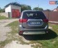 Серый Мицубиси Аутлендер, объемом двигателя 2 л и пробегом 93 тыс. км за 19300 $, фото 1 на Automoto.ua