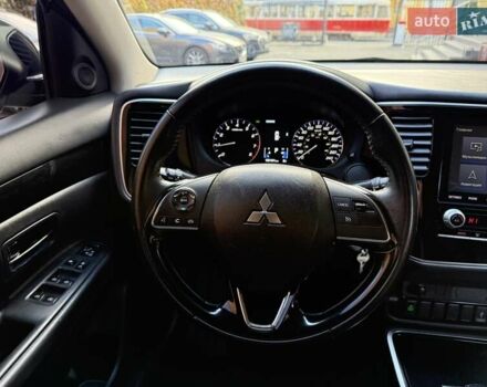 Серый Мицубиси Аутлендер, объемом двигателя 2.36 л и пробегом 136 тыс. км за 14900 $, фото 18 на Automoto.ua