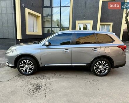 Серый Мицубиси Аутлендер, объемом двигателя 2.36 л и пробегом 136 тыс. км за 14900 $, фото 3 на Automoto.ua