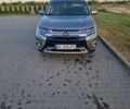 Серый Мицубиси Аутлендер, объемом двигателя 2.36 л и пробегом 86 тыс. км за 20000 $, фото 1 на Automoto.ua