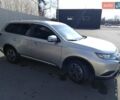 Серый Мицубиси Аутлендер, объемом двигателя 2 л и пробегом 32 тыс. км за 21000 $, фото 1 на Automoto.ua