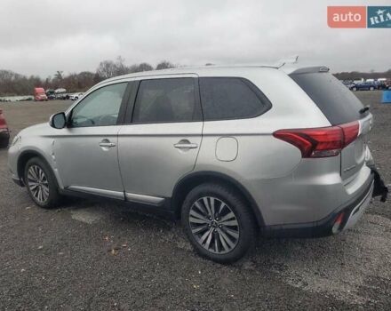 Серый Мицубиси Аутлендер, объемом двигателя 2.36 л и пробегом 112 тыс. км за 2900 $, фото 1 на Automoto.ua