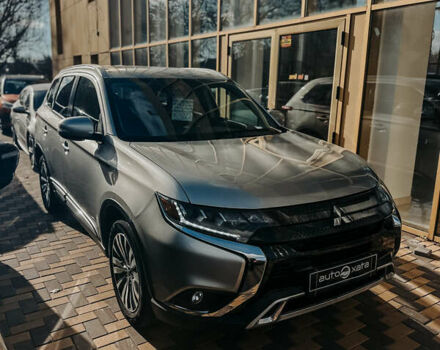 Серый Мицубиси Аутлендер, объемом двигателя 2.4 л и пробегом 95 тыс. км за 16500 $, фото 1 на Automoto.ua