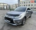 Серый Мицубиси Аутлендер, объемом двигателя 2.36 л и пробегом 136 тыс. км за 15000 $, фото 1 на Automoto.ua