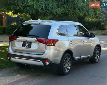 Серый Мицубиси Аутлендер, объемом двигателя 2.4 л и пробегом 80 тыс. км за 15900 $, фото 3 на Automoto.ua