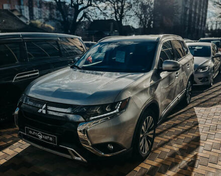 Серый Мицубиси Аутлендер, объемом двигателя 2.4 л и пробегом 95 тыс. км за 16500 $, фото 2 на Automoto.ua