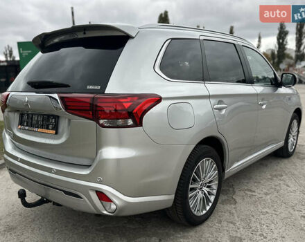 Сірий Міцубісі Аутлендер, об'ємом двигуна 2.36 л та пробігом 179 тис. км за 24950 $, фото 7 на Automoto.ua