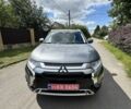Серый Мицубиси Аутлендер, объемом двигателя 2.4 л и пробегом 227 тыс. км за 17500 $, фото 1 на Automoto.ua