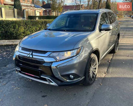 Серый Мицубиси Аутлендер, объемом двигателя 2.4 л и пробегом 120 тыс. км за 23200 $, фото 2 на Automoto.ua