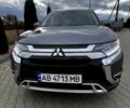 Серый Мицубиси Аутлендер, объемом двигателя 2.4 л и пробегом 221 тыс. км за 18300 $, фото 1 на Automoto.ua