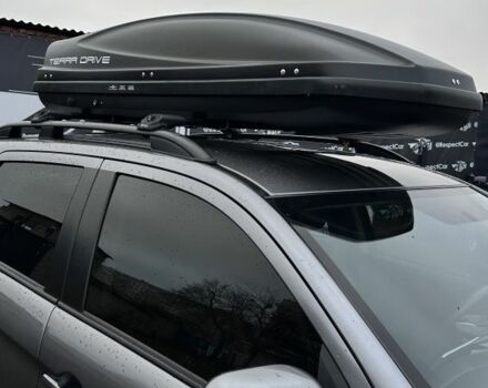 Серый Мицубиси Аутлендер, объемом двигателя 2 л и пробегом 70 тыс. км за 16799 $, фото 4 на Automoto.ua