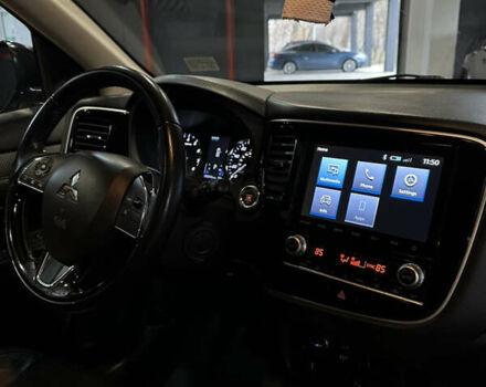 Серый Мицубиси Аутлендер, объемом двигателя 2.36 л и пробегом 130 тыс. км за 17300 $, фото 7 на Automoto.ua