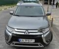 Серый Мицубиси Аутлендер, объемом двигателя 2.4 л и пробегом 122 тыс. км за 18300 $, фото 1 на Automoto.ua