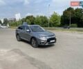 Серый Мицубиси Аутлендер, объемом двигателя 2.36 л и пробегом 125 тыс. км за 19500 $, фото 1 на Automoto.ua