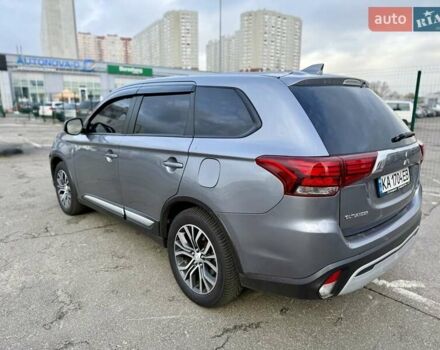 Серый Мицубиси Аутлендер, объемом двигателя 2.36 л и пробегом 136 тыс. км за 15000 $, фото 2 на Automoto.ua