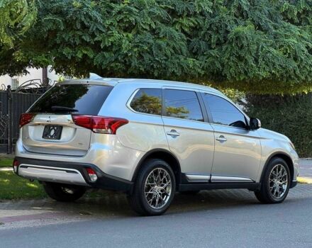 Серый Мицубиси Аутлендер, объемом двигателя 2.4 л и пробегом 80 тыс. км за 15900 $, фото 4 на Automoto.ua