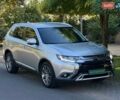 Серый Мицубиси Аутлендер, объемом двигателя 2.4 л и пробегом 80 тыс. км за 15900 $, фото 1 на Automoto.ua