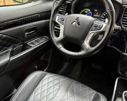 Серый Мицубиси Аутлендер, объемом двигателя 2.36 л и пробегом 179 тыс. км за 24900 $, фото 18 на Automoto.ua