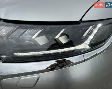 Сірий Міцубісі Аутлендер, об'ємом двигуна 2.36 л та пробігом 179 тис. км за 24950 $, фото 11 на Automoto.ua