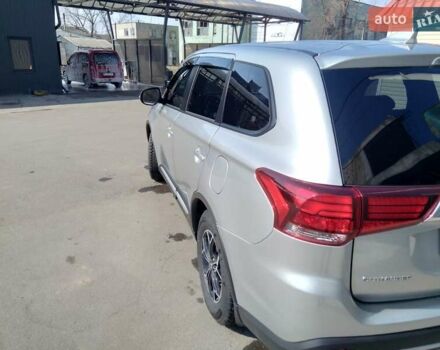 Серый Мицубиси Аутлендер, объемом двигателя 2 л и пробегом 32 тыс. км за 21000 $, фото 1 на Automoto.ua