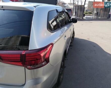 Серый Мицубиси Аутлендер, объемом двигателя 2 л и пробегом 32 тыс. км за 21000 $, фото 2 на Automoto.ua