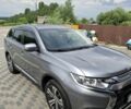 Серый Мицубиси Аутлендер, объемом двигателя 2 л и пробегом 58 тыс. км за 22000 $, фото 1 на Automoto.ua
