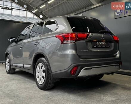 Серый Мицубиси Аутлендер, объемом двигателя 2 л и пробегом 91 тыс. км за 19000 $, фото 16 на Automoto.ua
