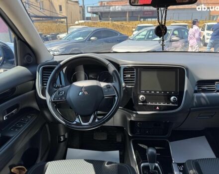 Серый Мицубиси Аутлендер, объемом двигателя 2 л и пробегом 58 тыс. км за 21790 $, фото 15 на Automoto.ua