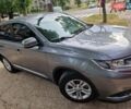 Серый Мицубиси Аутлендер, объемом двигателя 2 л и пробегом 150 тыс. км за 19000 $, фото 1 на Automoto.ua