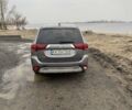 Серый Мицубиси Аутлендер, объемом двигателя 2 л и пробегом 179 тыс. км за 20000 $, фото 1 на Automoto.ua