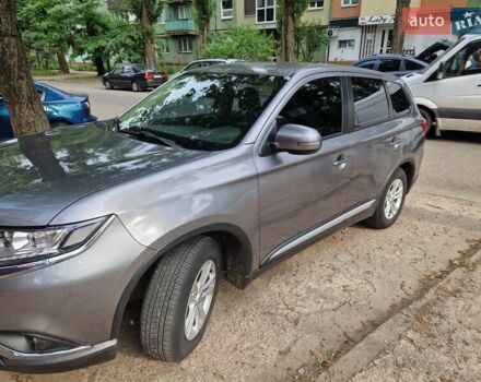 Серый Мицубиси Аутлендер, объемом двигателя 2 л и пробегом 150 тыс. км за 19000 $, фото 2 на Automoto.ua