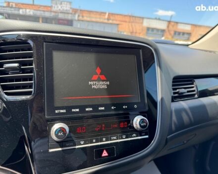 Серый Мицубиси Аутлендер, объемом двигателя 2 л и пробегом 58 тыс. км за 21790 $, фото 23 на Automoto.ua
