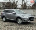 Серый Мицубиси Аутлендер, объемом двигателя 2 л и пробегом 122 тыс. км за 20990 $, фото 1 на Automoto.ua