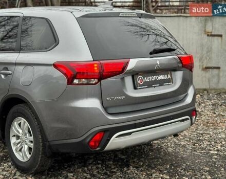 Серый Мицубиси Аутлендер, объемом двигателя 2 л и пробегом 122 тыс. км за 20990 $, фото 6 на Automoto.ua