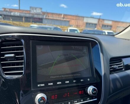 Серый Мицубиси Аутлендер, объемом двигателя 2 л и пробегом 58 тыс. км за 21790 $, фото 26 на Automoto.ua